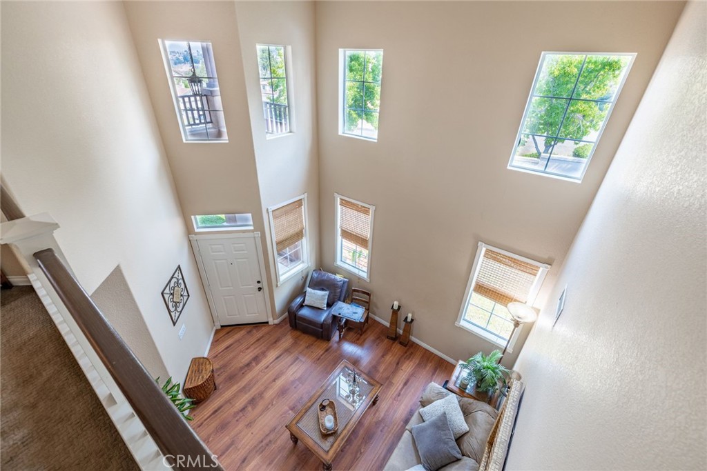 17821 Morning Rock Circle Riverside, CA 92503 - Photo 22 of 47 a view of living room with furniture and a wooden floor