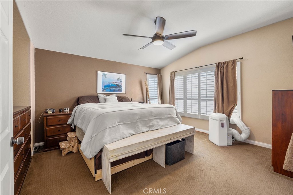 17821 Morning Rock Circle Riverside, CA 92503 - Photo 26 of 47 a bedroom with a bed and window