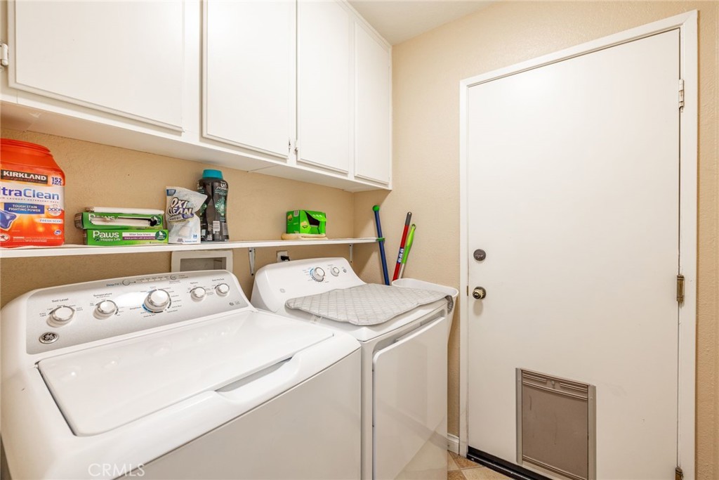 17821 Morning Rock Circle Riverside, CA 92503 - Photo 30 of 47 a utility room with dryer and washer
