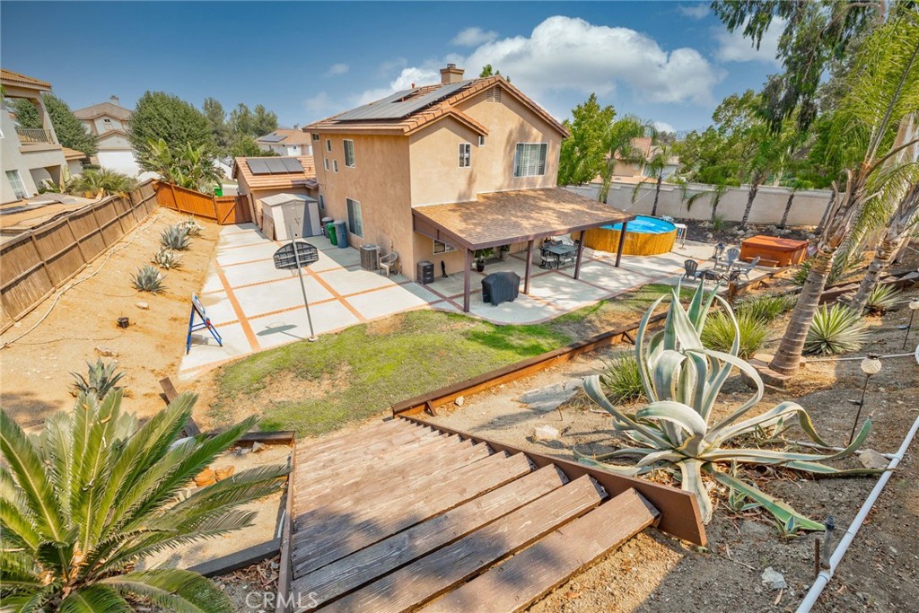 17821 Morning Rock Circle Riverside, CA 92503 - Photo 31 of 47 a view of a patio with swimming pool