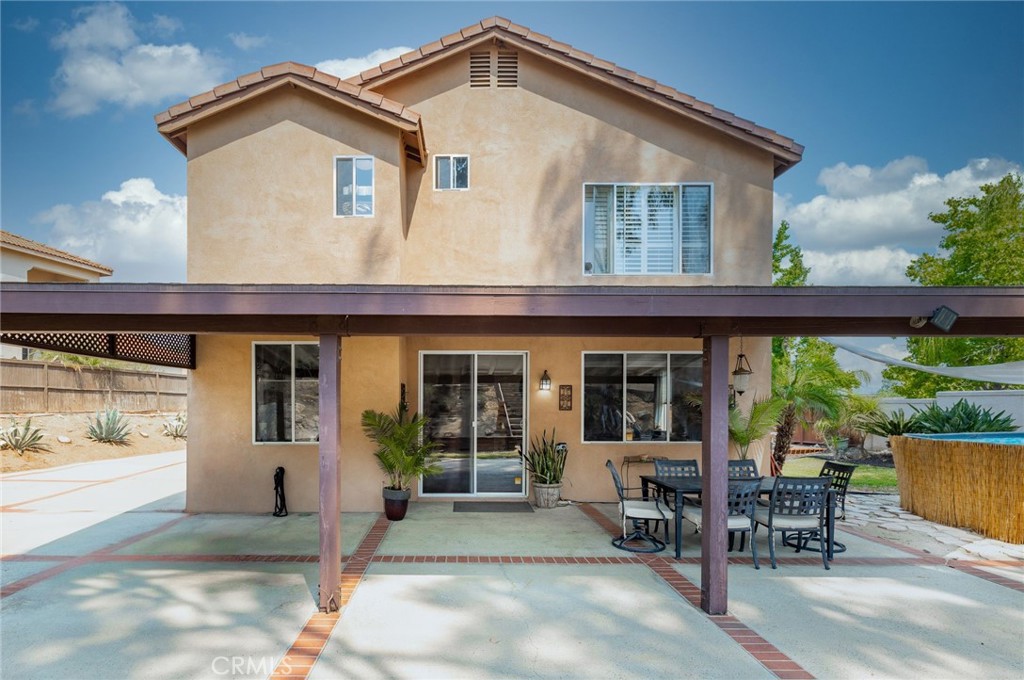 17821 Morning Rock Circle Riverside, CA 92503 - Photo 32 of 47 a front view of a house with porch