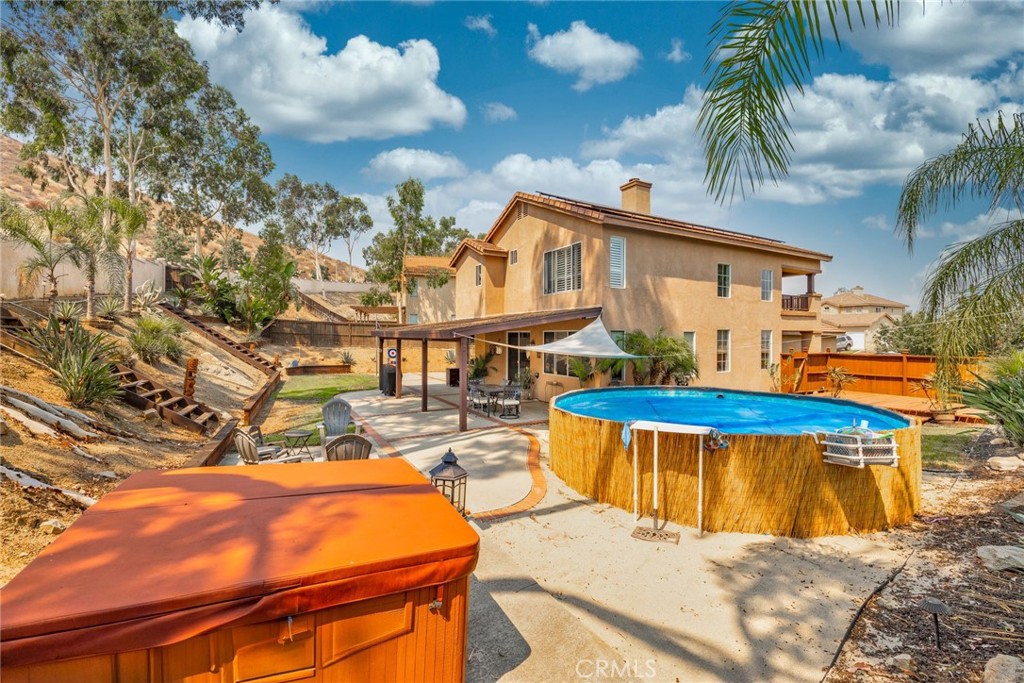 17821 Morning Rock Circle Riverside, CA 92503 - Photo 33 of 47 a view of a swimming pool with an outdoor seating