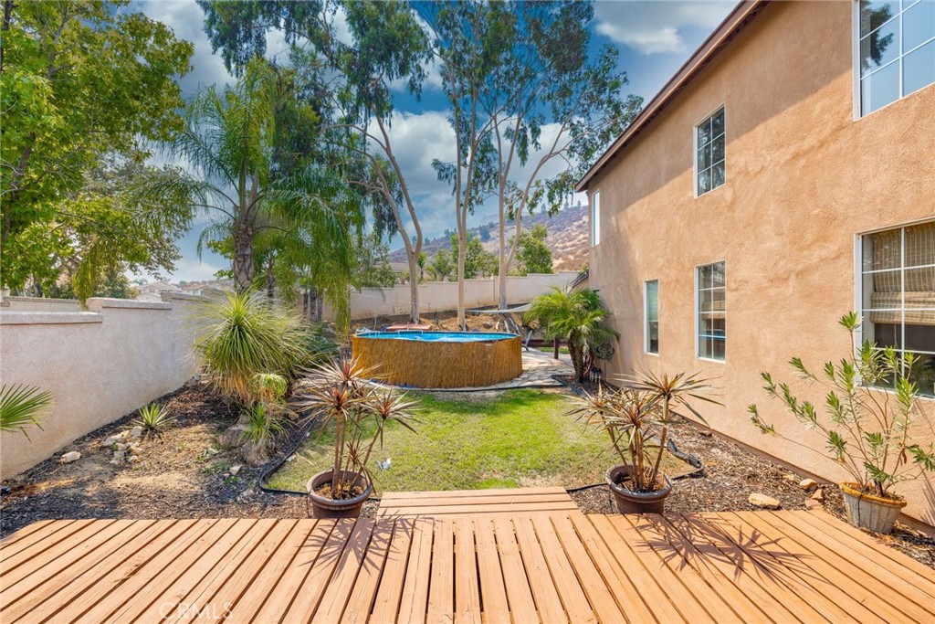 17821 Morning Rock Circle Riverside, CA 92503 - Photo 37 of 47 a view of a swimming pool with a patio
