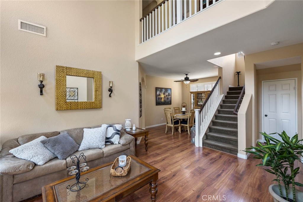 17821 Morning Rock Circle Riverside, CA 92503 - Photo 6 of 47 a living room with furniture and wooden floor