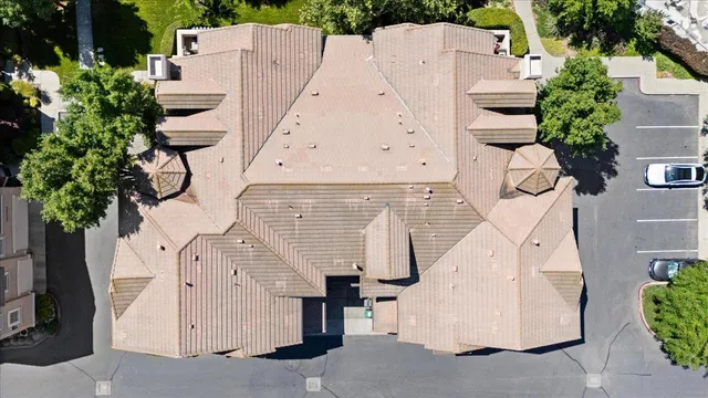 an aerial view of a house with entryway and stairs