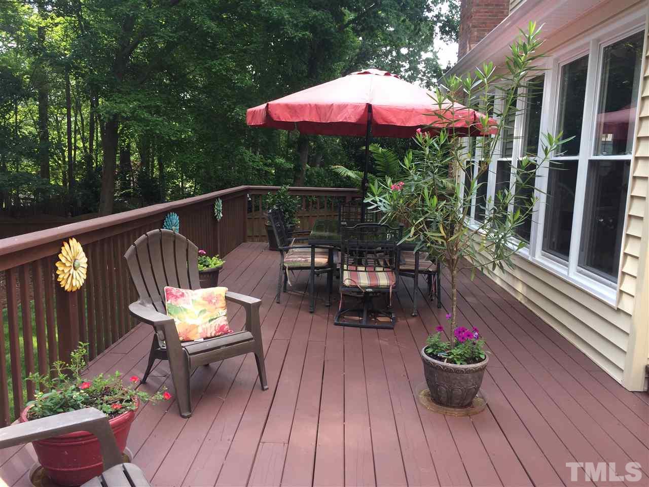 7920 Sutterton Court Raleigh, NC 27615 - Photo 15 of 22 a view of a patio with furniture and wooden floor