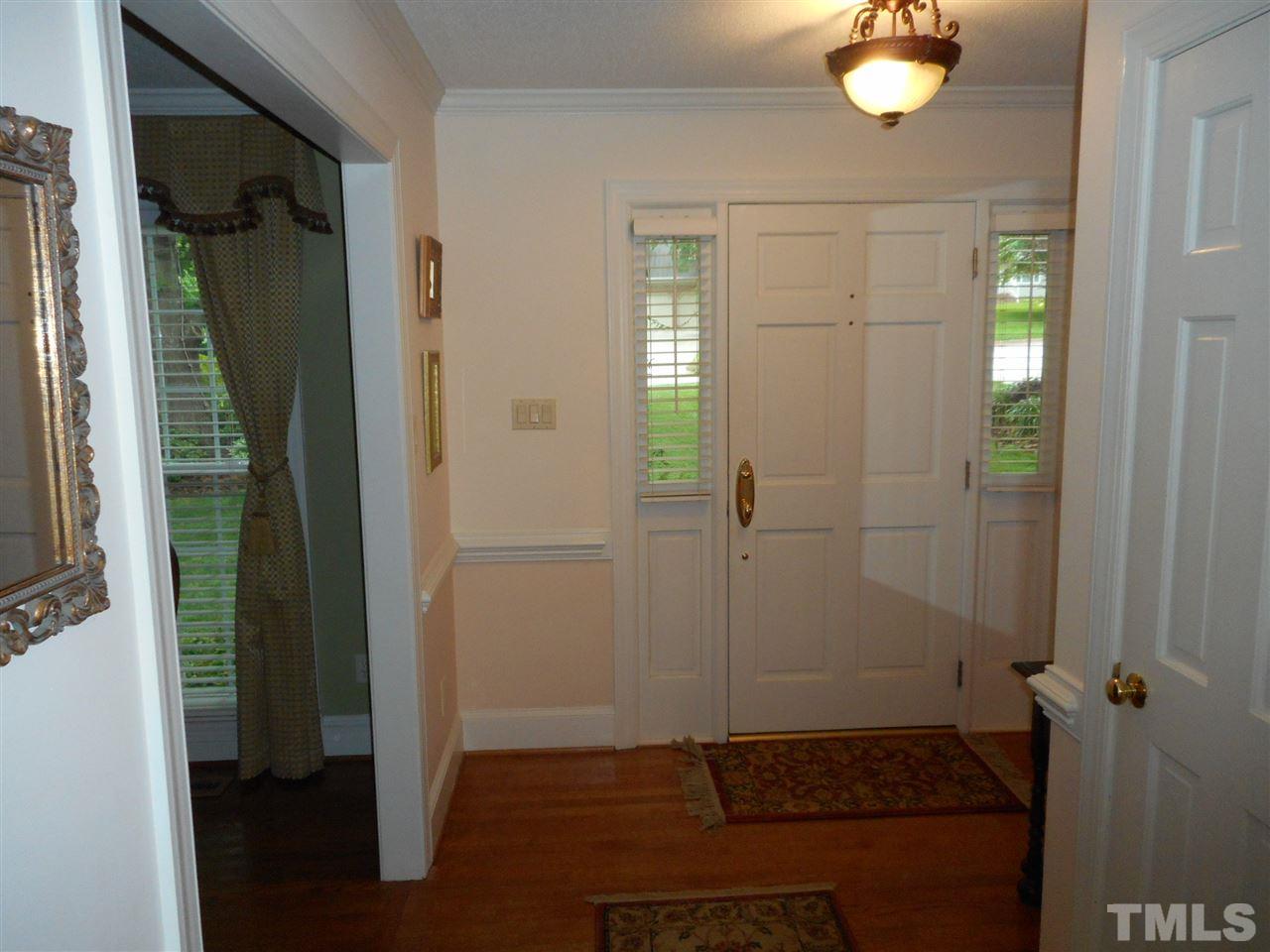 7920 Sutterton Court Raleigh, NC 27615 - Photo 9 of 22 wooden floor in a gallery