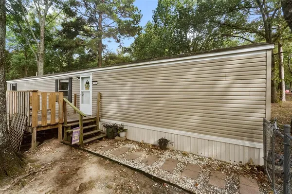 a view of a back yard of the house