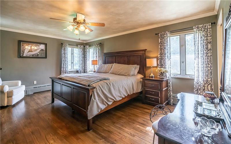 231 Brown Road Wexford, PA 15090 - Photo 16 of 25 Large Master Bedroom with beautiful hardwood flooring. Fan/light combination.
