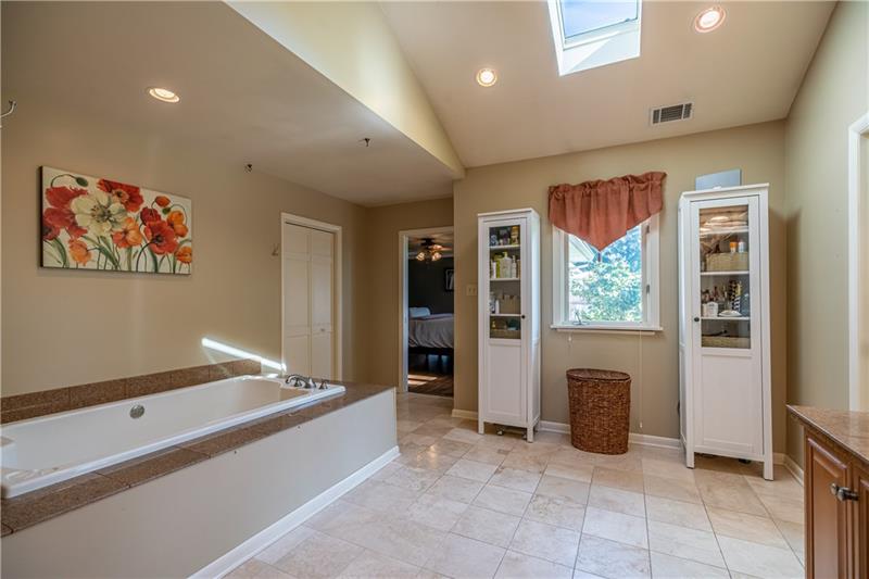 231 Brown Road Wexford, PA 15090 - Photo 18 of 25 Walk-in Closet and white cabinets stay. Ample light with skylight.