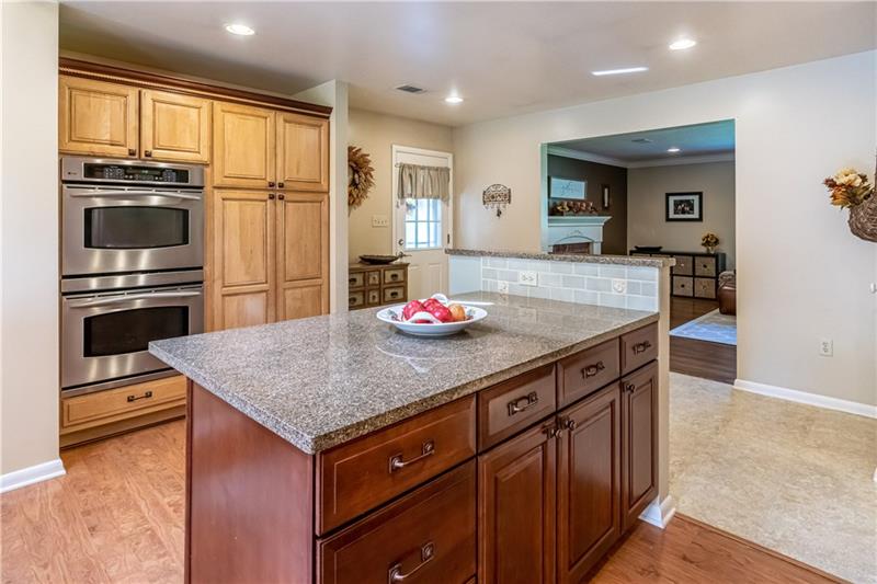 231 Brown Road Wexford, PA 15090 - Photo 10 of 25 A center island with ample counter space to prepare many family meals. Lots of cabinetry for storage. Double Oven with convection oven option on top.