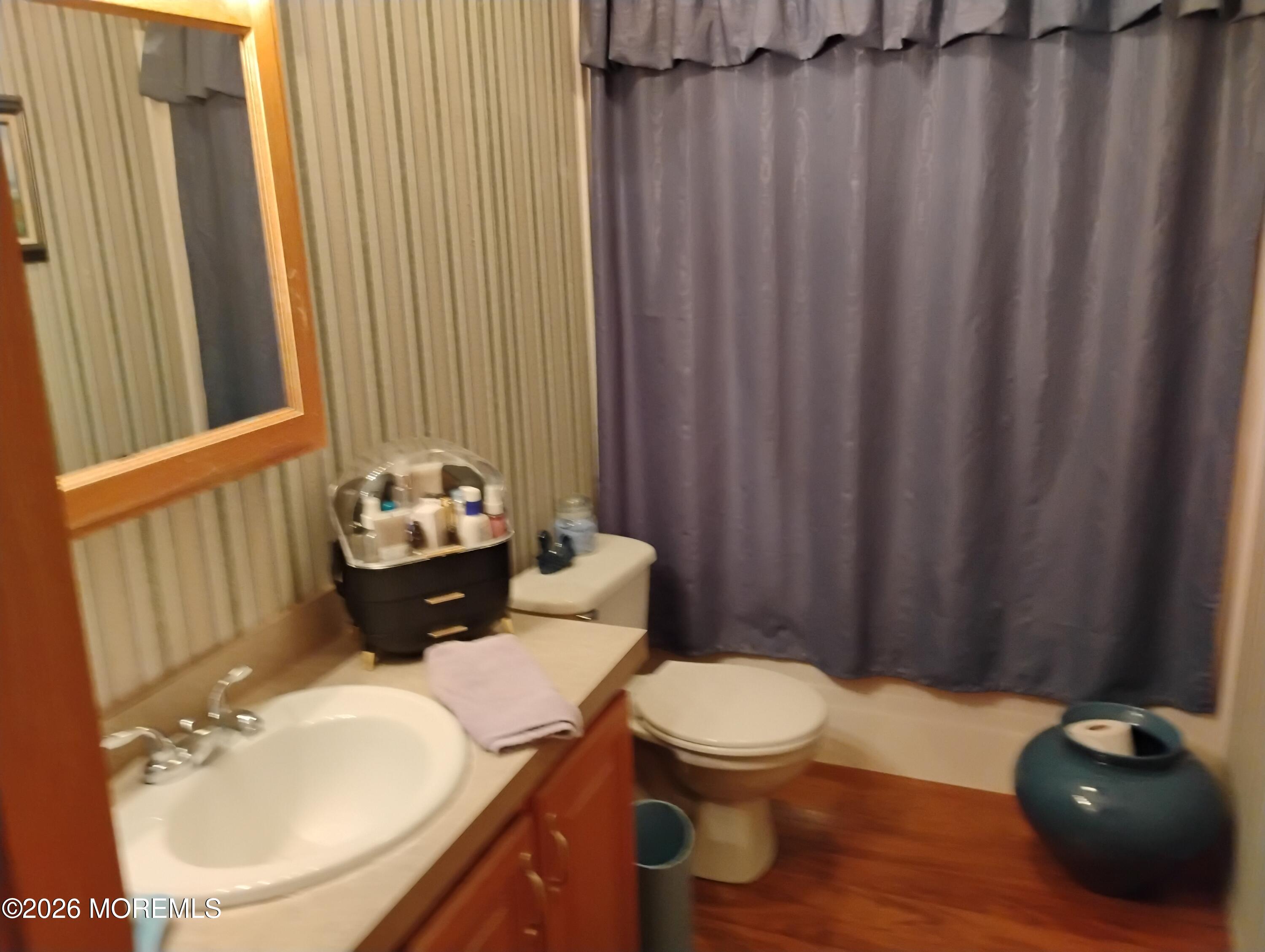 1208 Winding Brook Way Whiting, NJ 08759 - Photo 12 of 21 a bathroom with a sink toilet and shower