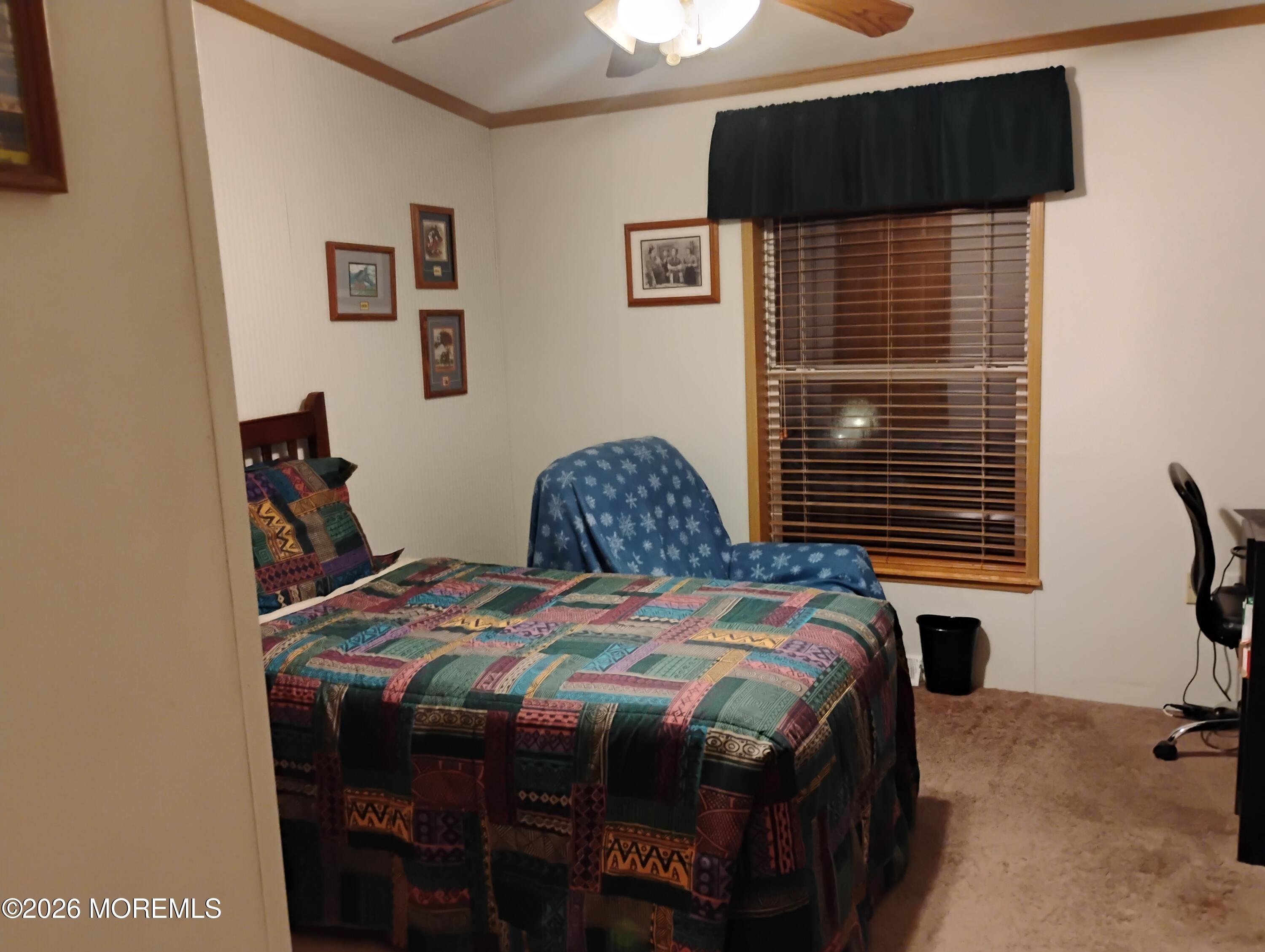 1208 Winding Brook Way Whiting, NJ 08759 - Photo 13 of 21 a bedroom with a bed dresser and a window
