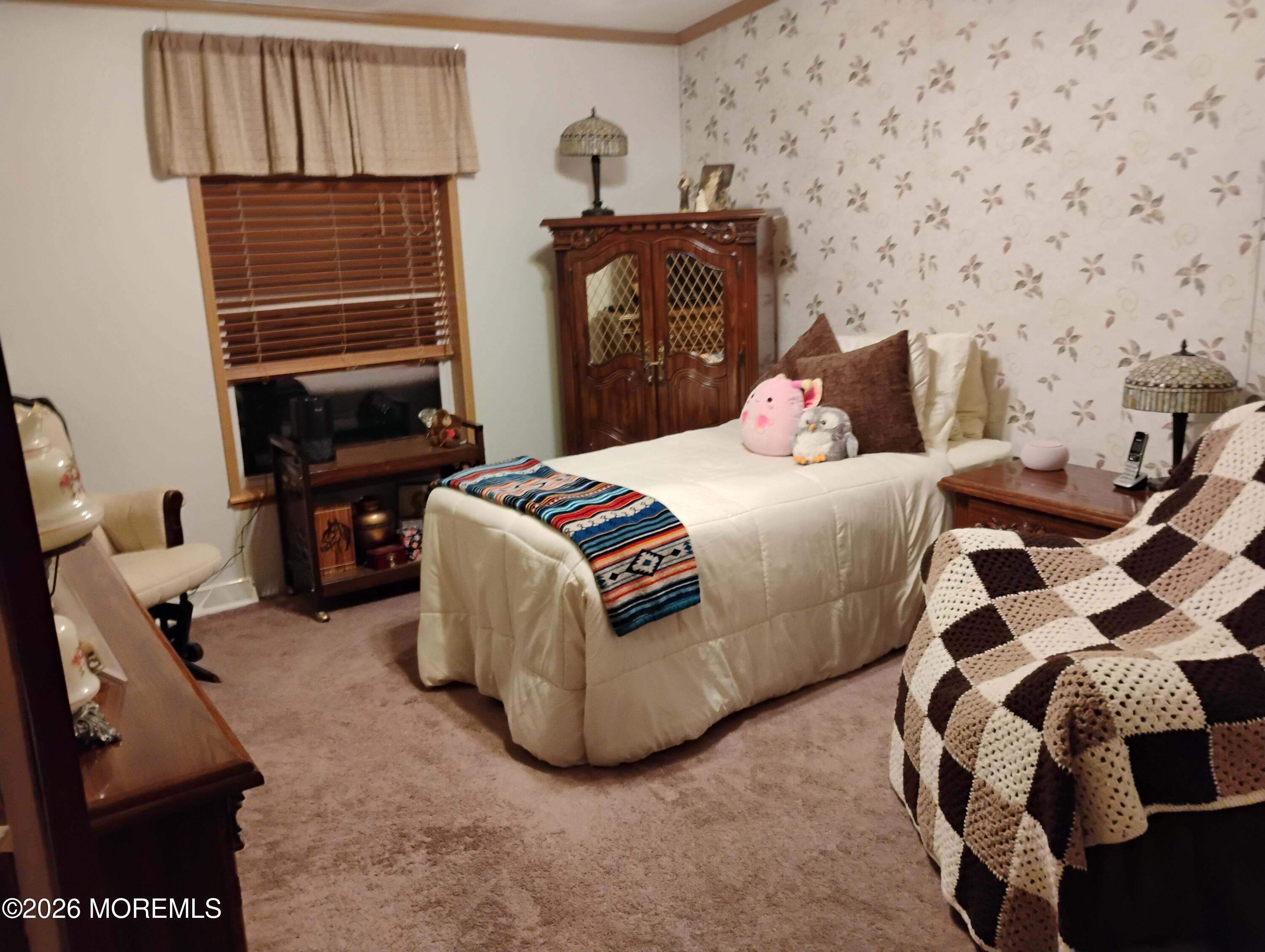 1208 Winding Brook Way Whiting, NJ 08759 - Photo 15 of 21 a bedroom with a bed and dresser