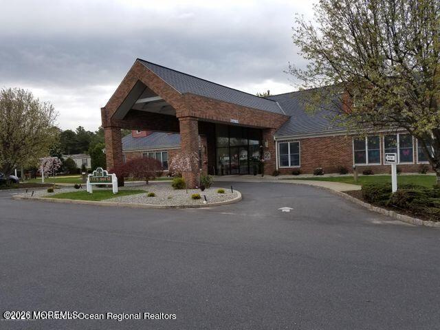 1208 Winding Brook Way Whiting, NJ 08759 - Photo 18 of 21 a view of a house with a patio