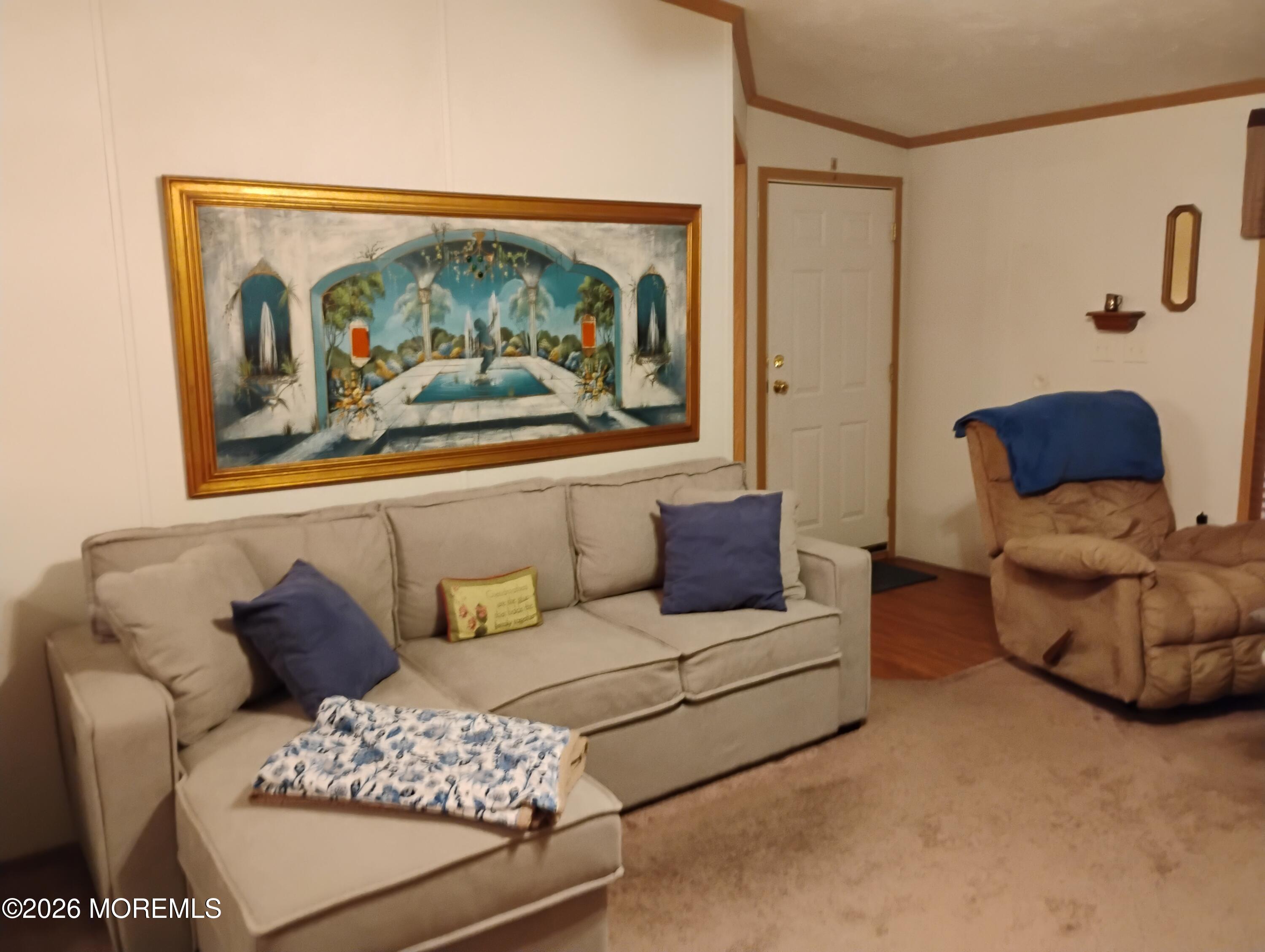 1208 Winding Brook Way Whiting, NJ 08759 - Photo 4 of 21 a living room with furniture and a painting