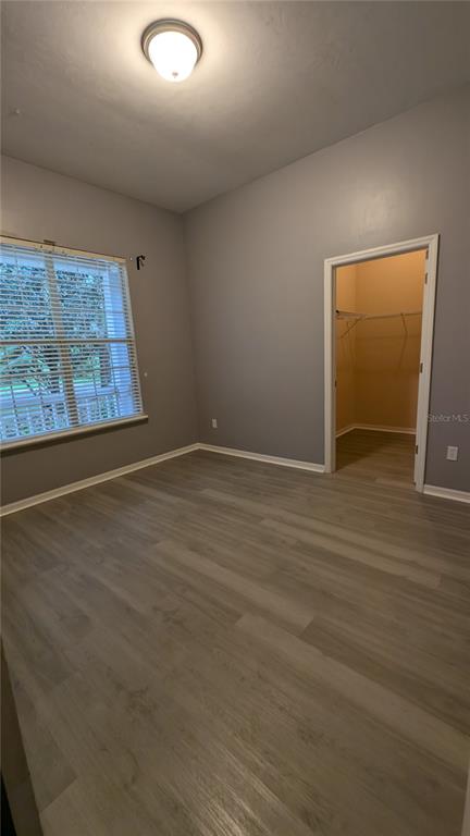 7401 Southwest 86th Way Gainesville, FL 32608 - Photo 8 of 12 an empty room with windows