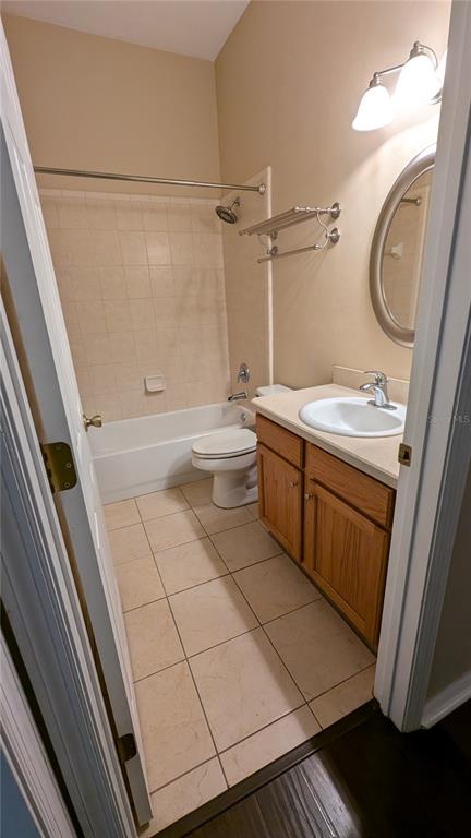 7401 Southwest 86th Way Gainesville, FL 32608 - Photo 10 of 12 a bathroom with a sink a toilet a mirror and shower