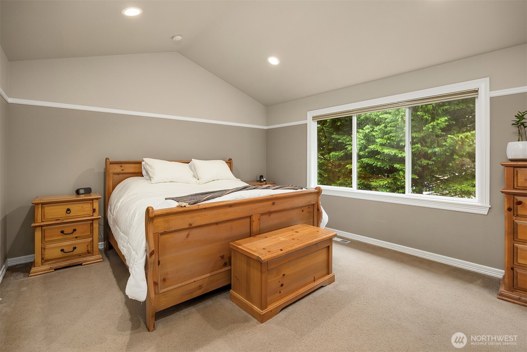 23703 Southeast 284th Street Maple Valley, WA 98038 - Photo 15 of 33 a bedroom with a bed and a window