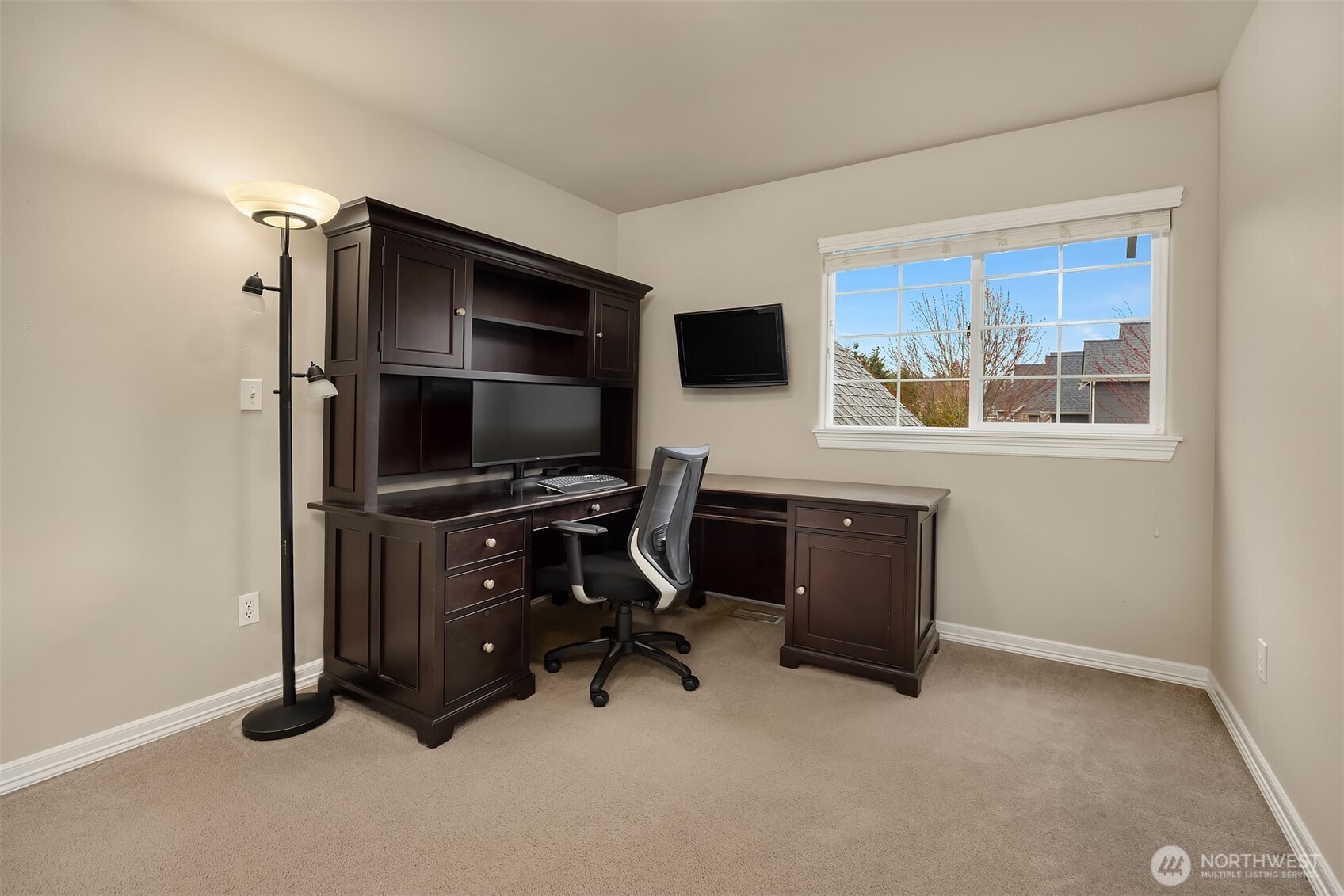 23703 Southeast 284th Street Maple Valley, WA 98038 - Photo 23 of 33 a view of a workspace with furniture and a window