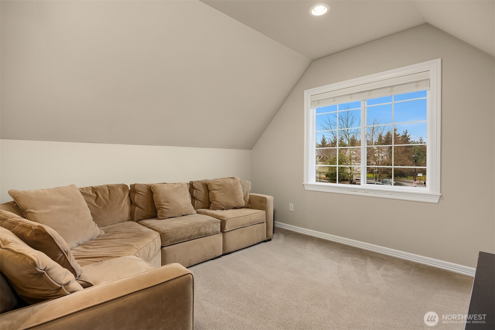 23703 Southeast 284th Street Maple Valley, WA 98038 - Photo 24 of 33 a living room with furniture and a window