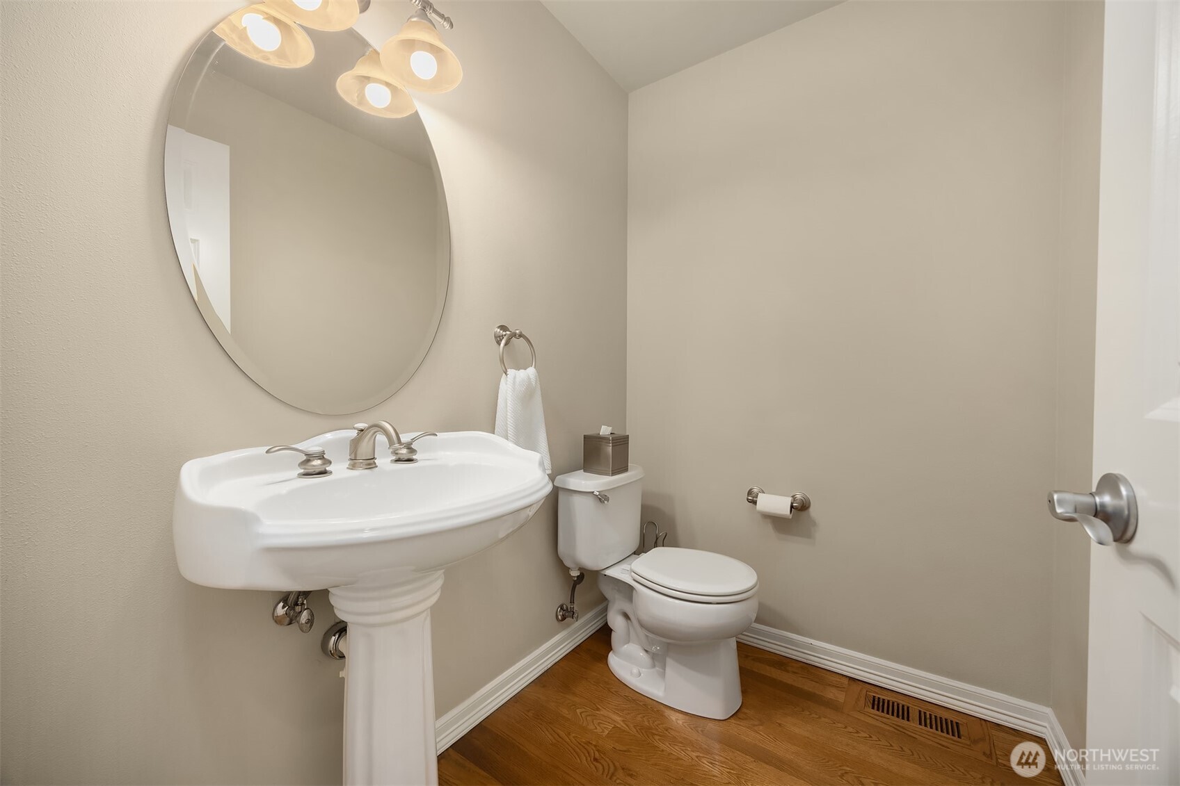 23703 Southeast 284th Street Maple Valley, WA 98038 - Photo 26 of 33 a bathroom with a sink toilet and a mirror