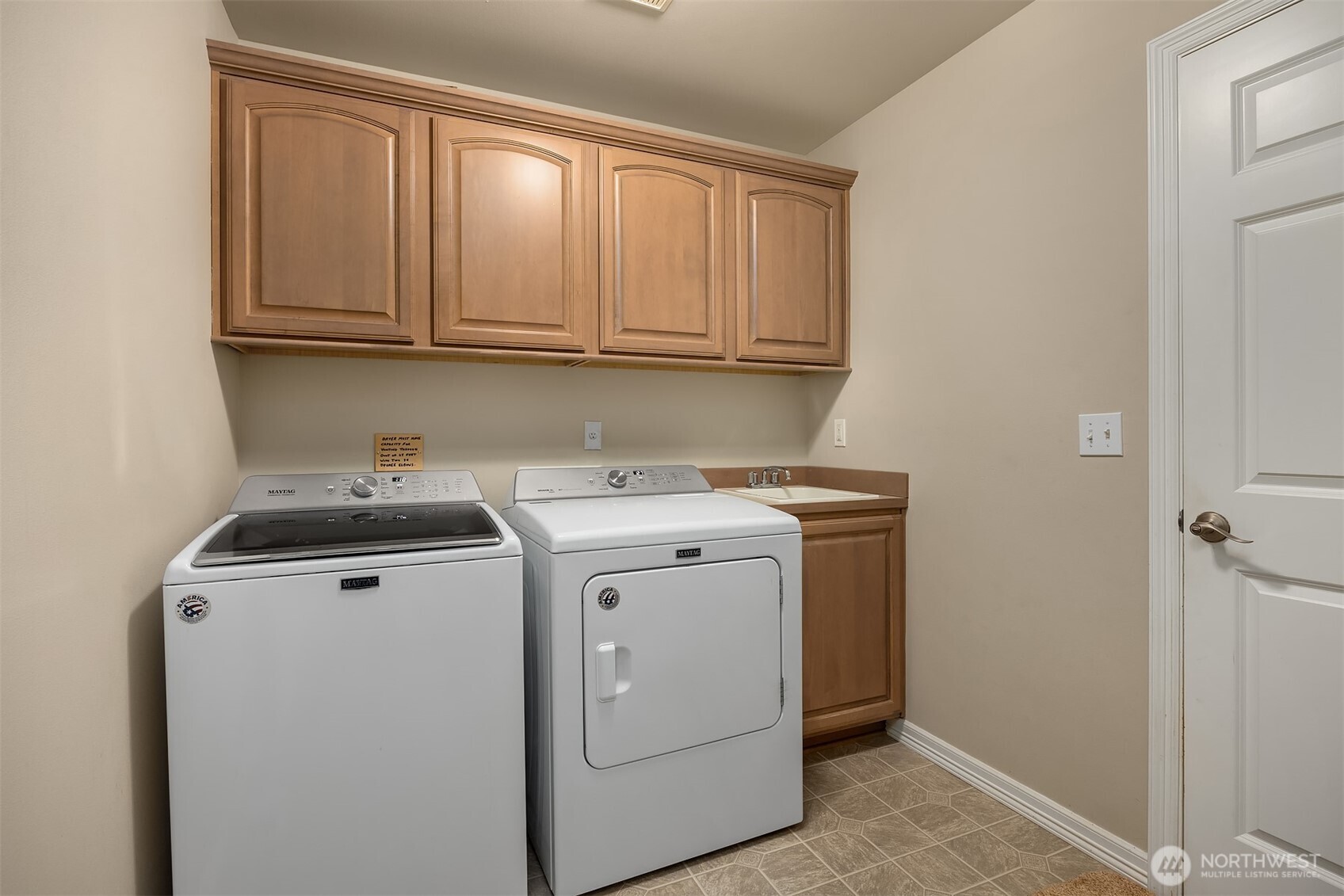 23703 Southeast 284th Street Maple Valley, WA 98038 - Photo 27 of 33 a utility room with dryer and washer