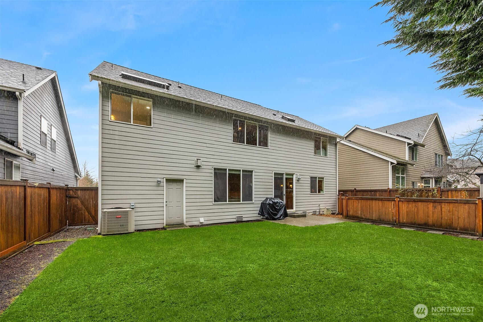 23703 Southeast 284th Street Maple Valley, WA 98038 - Photo 28 of 33 a front view of house with yard