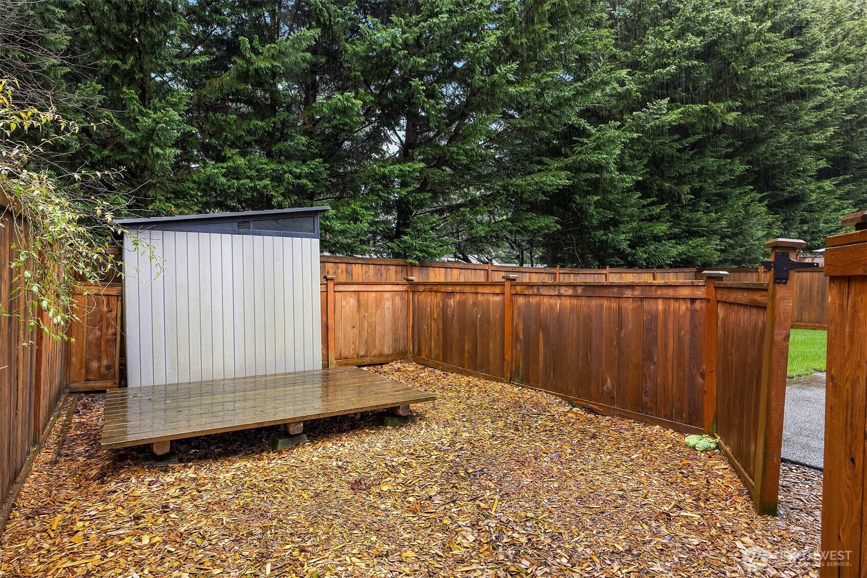 23703 Southeast 284th Street Maple Valley, WA 98038 - Photo 31 of 33 a view of backyard with wooden fence
