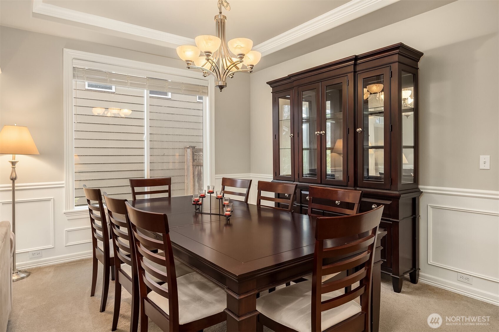 23703 Southeast 284th Street Maple Valley, WA 98038 - Photo 5 of 33 a dining room with furniture a chandelier and window