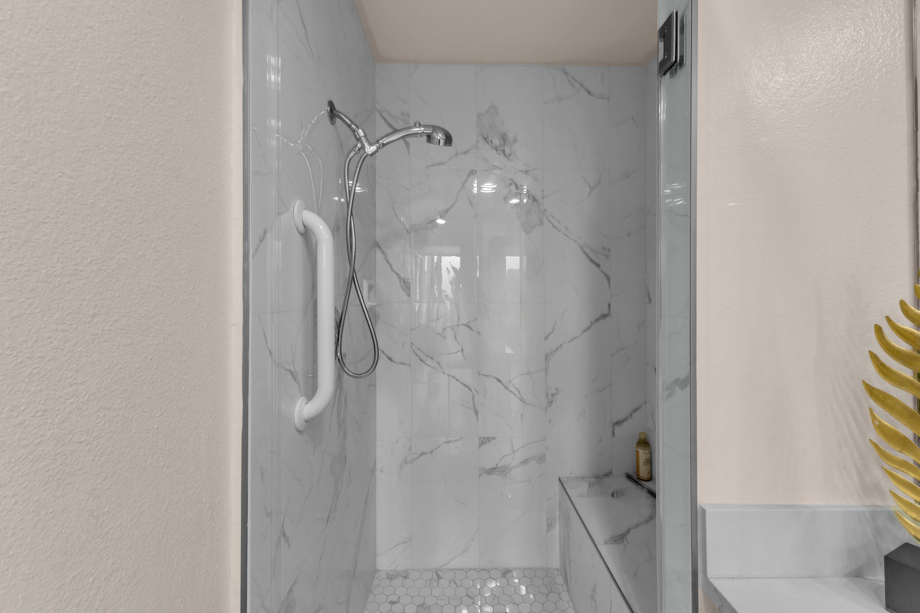 910 Island Drive, Unit 112 Rancho Mirage, CA 92270 - Photo 36 of 47 a bathroom with a granite countertop shower and a toilet