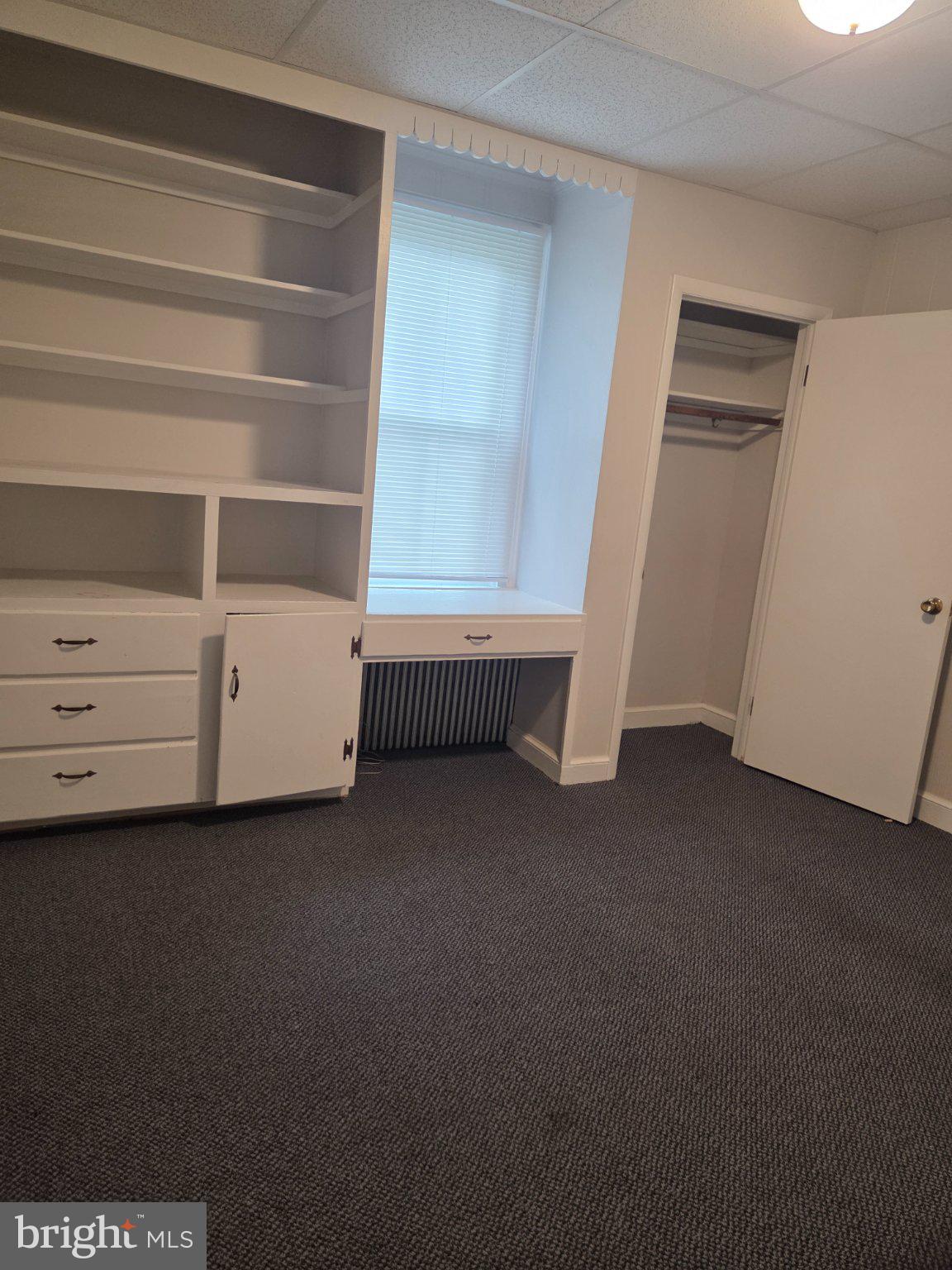 23630 Woodfield Road Gaithersburg, MD 20882 - Photo 6 of 14 Bright and spacious room with storage.
