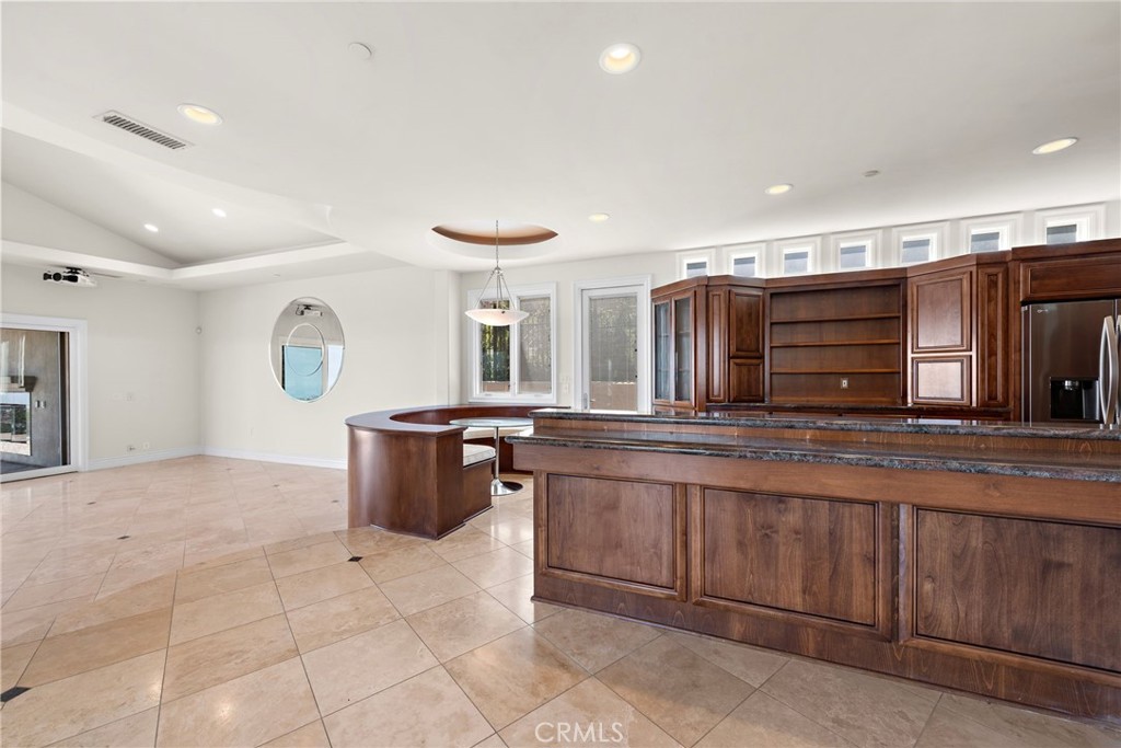 14 Mar Del Rey San Clemente, CA 92673 - Photo 13 of 70 a kitchen with stainless steel appliances granite countertop a sink and cabinets