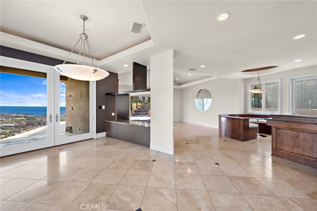 14 Mar Del Rey San Clemente, CA 92673 - Photo 17 of 70 a view of a kitchen with a stove and a refrigerator