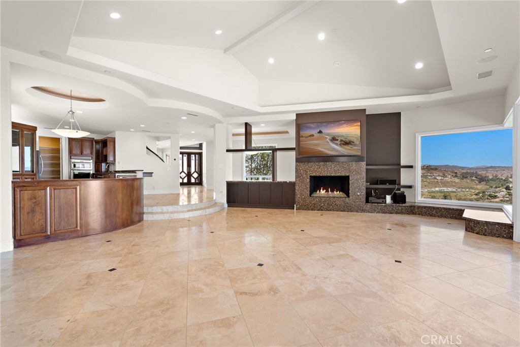 14 Mar Del Rey San Clemente, CA 92673 - Photo 19 of 70 a view of kitchen with furniture and a fireplace