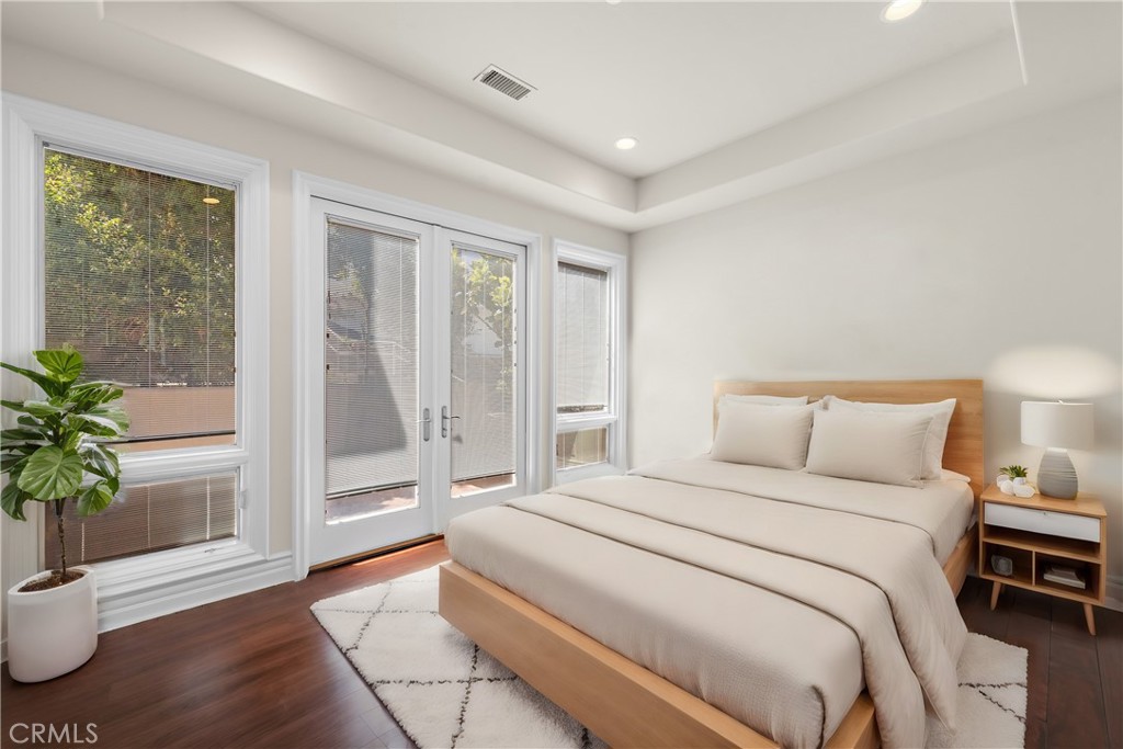 14 Mar Del Rey San Clemente, CA 92673 - Photo 47 of 70 a bedroom with a large bed and a potted plant