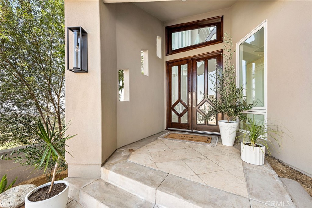 14 Mar Del Rey San Clemente, CA 92673 - Photo 6 of 70 a potted plant sitting in front of a house