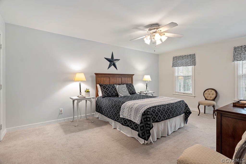 13813 Shadow Ridge Road Midlothian, VA 23112 - Photo 21 of 49 a spacious bedroom with a bed and window