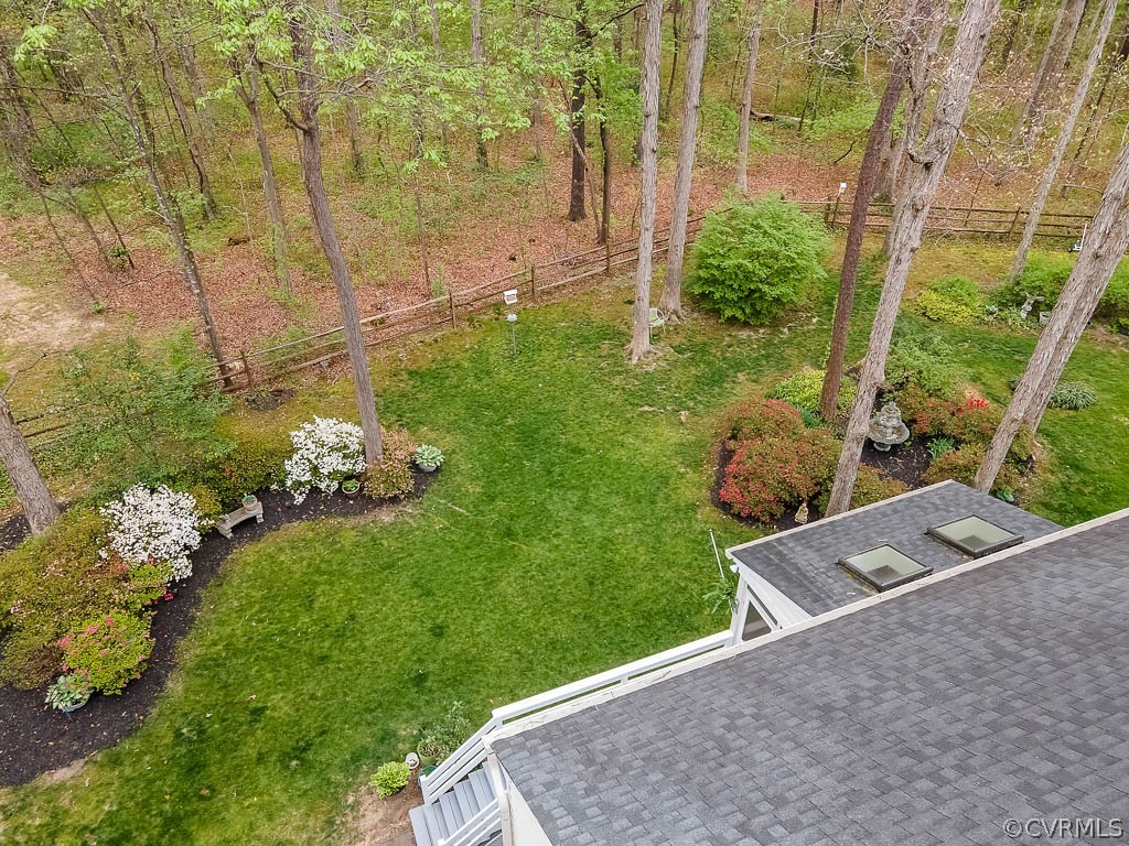 13813 Shadow Ridge Road Midlothian, VA 23112 - Photo 40 of 49 a backyard of a house with lots of green space