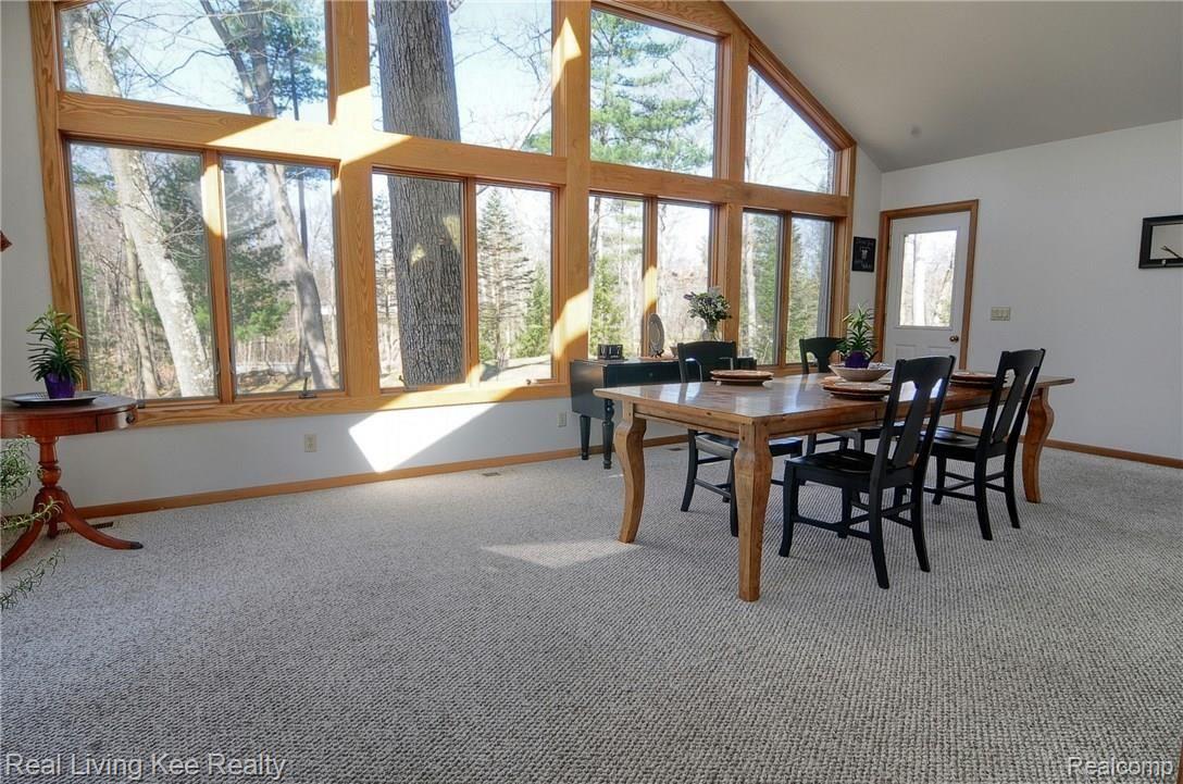254 Ridgemont Road Oxford, MI 48370 - Photo 18 of 47 Sunroom with West facing wall of windows!