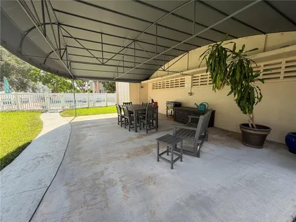 a view of outdoor space and swimming pool
