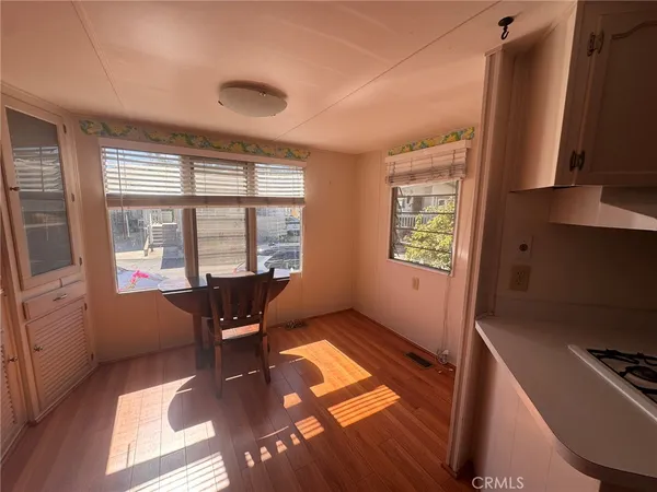 a workspace with furniture and window