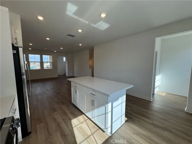 a bathroom with a sink vanity and mirror