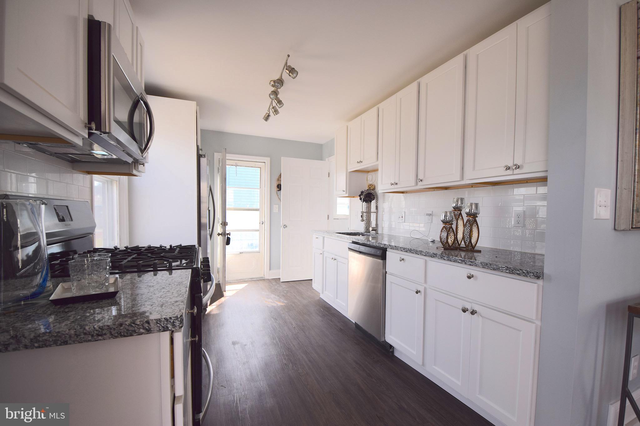 1752 Brookview Road Baltimore, MD 21222 - Photo 5 of 37 Galley Kitchen with Brand New SS Appliances