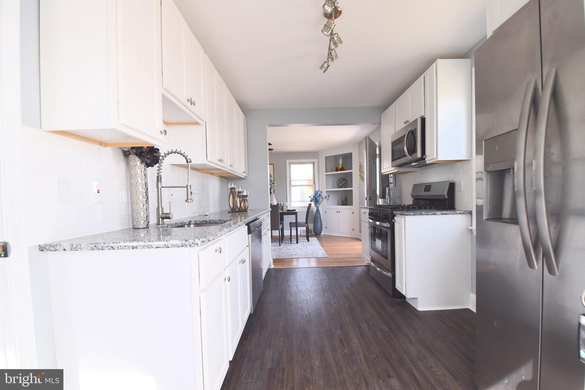 1752 Brookview Road Baltimore, MD 21222 - Photo 8 of 37 Galley Kitchen with Brand New SS AppliancesGalley