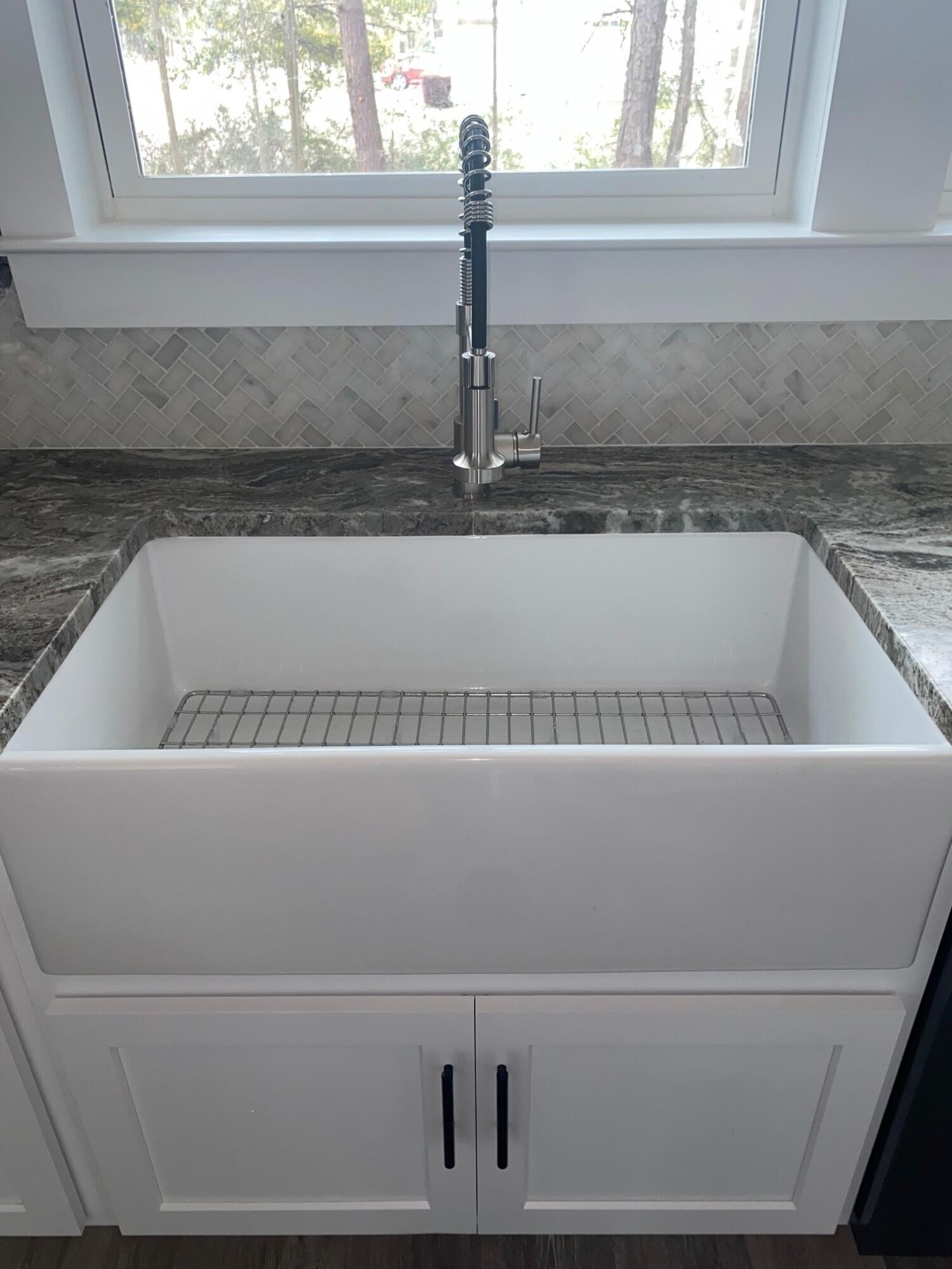 575 East Roberts Road DeFuniak Springs, FL 32433 - Photo 4 of 7 a close view of sink sitting in a kitchen