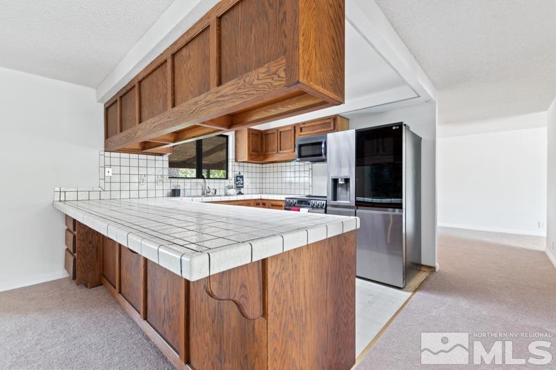 9465 Tomahawk Way Reno, NV 89506 - Photo 8 of 40 Photo 8