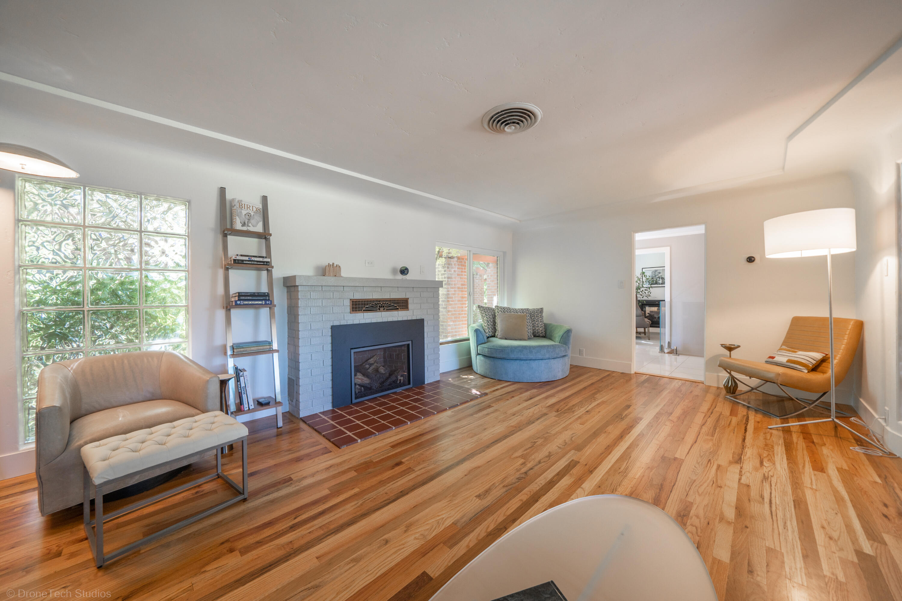 3274 Wilshire Drive Redding, CA 96002 - Photo 13 of 107 a spacious bedroom with a bed and large windows