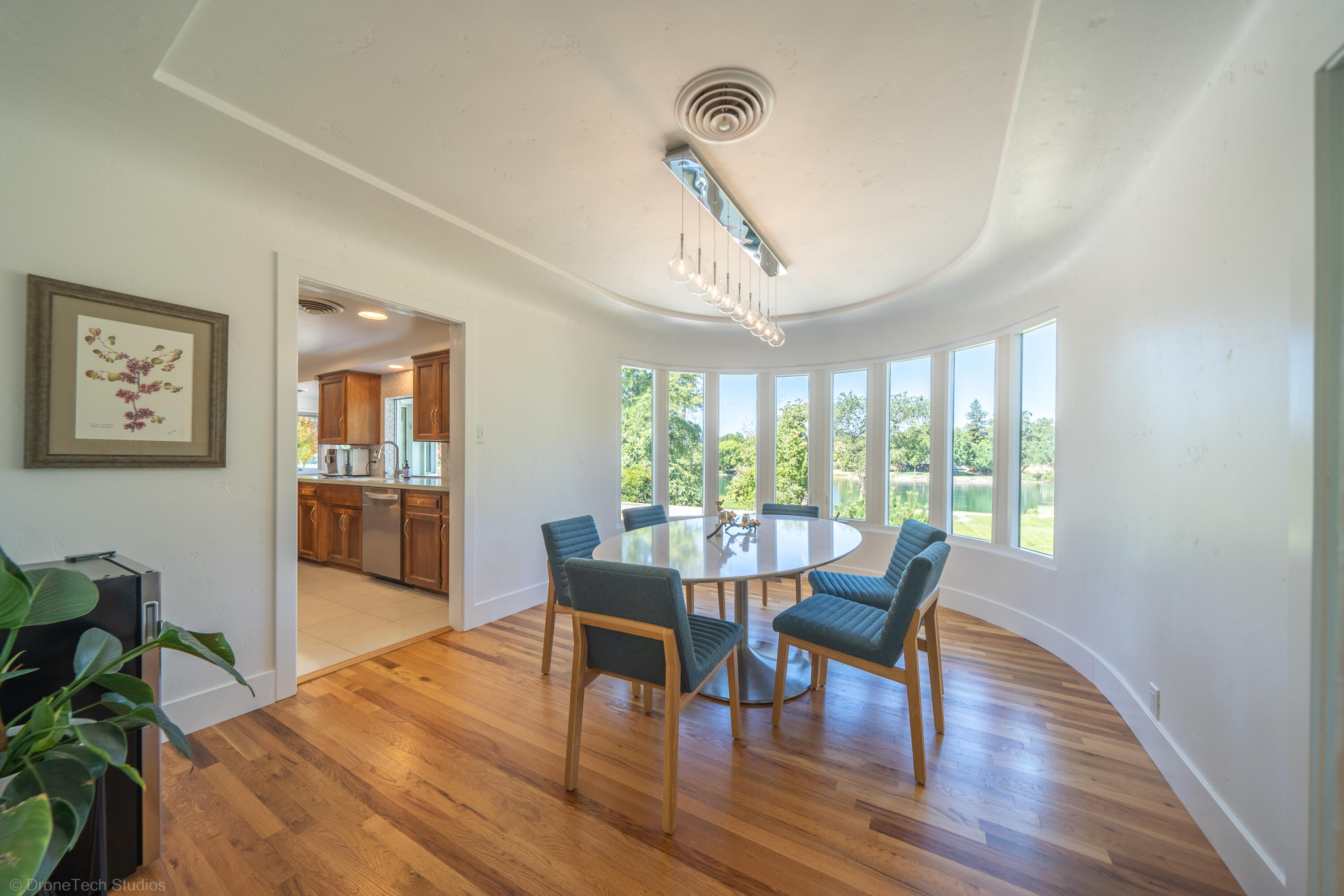 3274 Wilshire Drive Redding, CA 96002 - Photo 15 of 107 a view of a dining room with furniture window and wooden floor