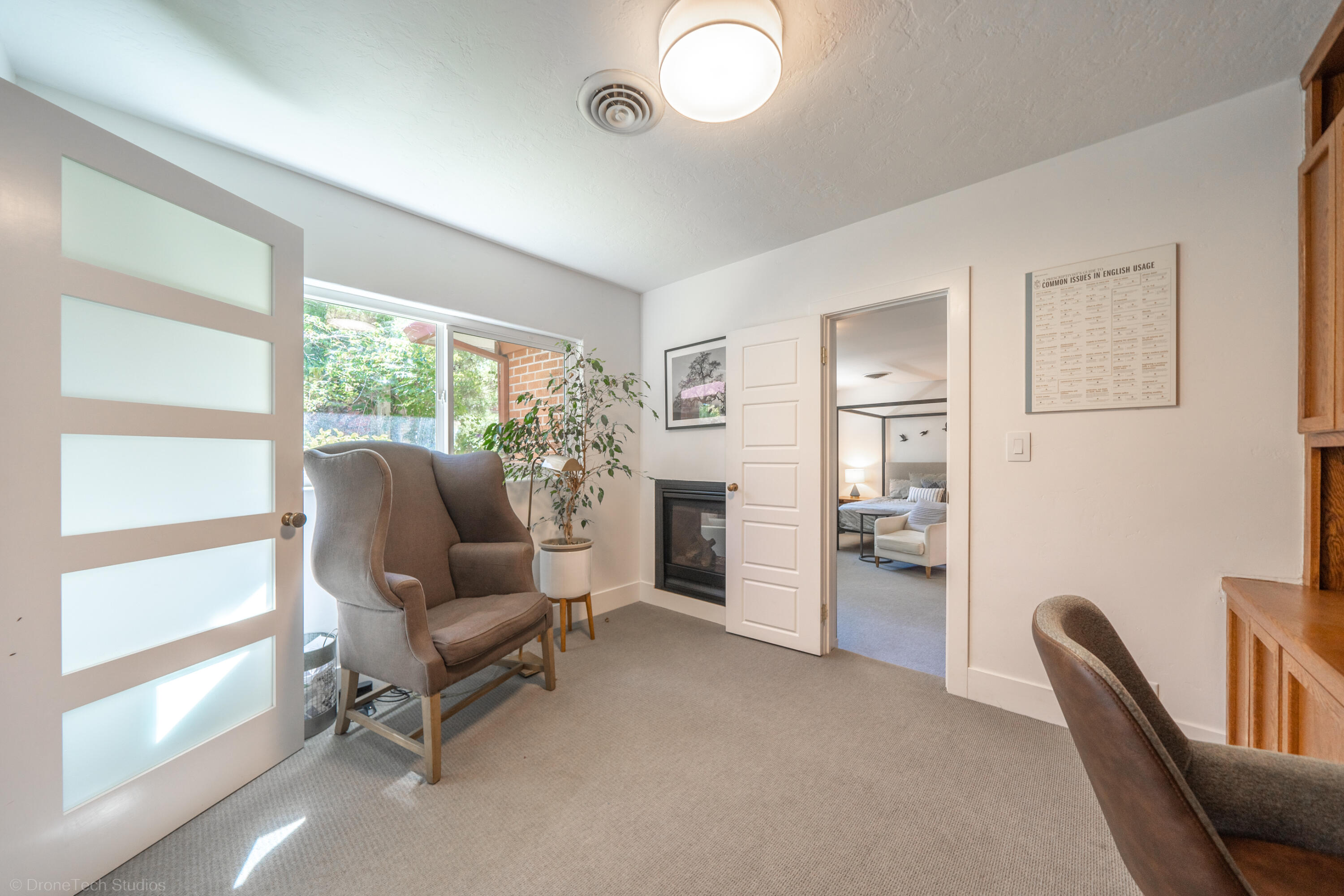 3274 Wilshire Drive Redding, CA 96002 - Photo 34 of 107 a living room with furniture and a large window